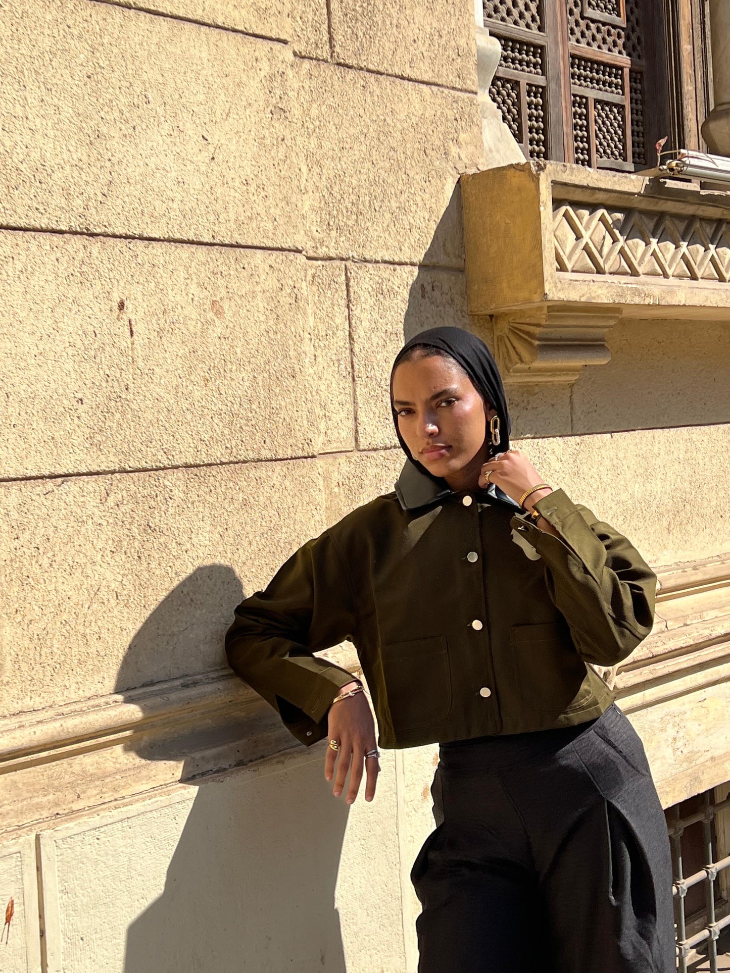 Khaki jacket with black leather collar