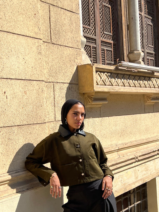 Khaki jacket with black leather collar